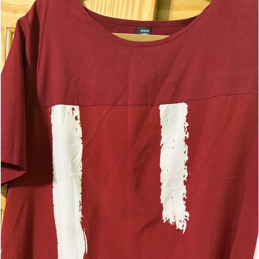 Maroon dress.